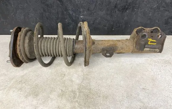 Toyota Avensis T250 Front shock absorber with coil spring