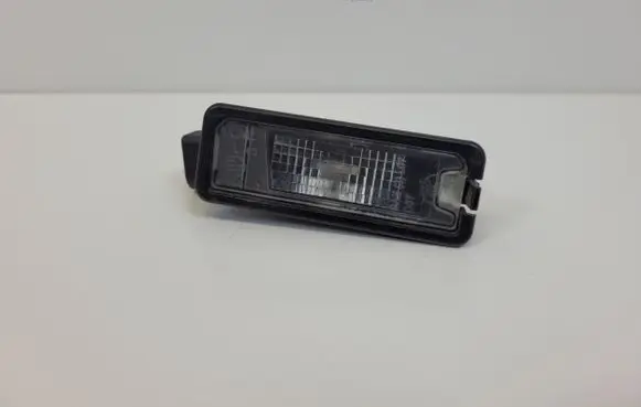 Volkswagen Golf VII Number plate light 1K8-943-021
