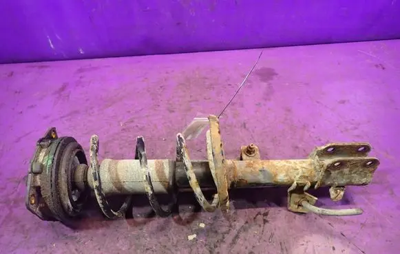 Nissan Micra Front shock absorber with coil spring 