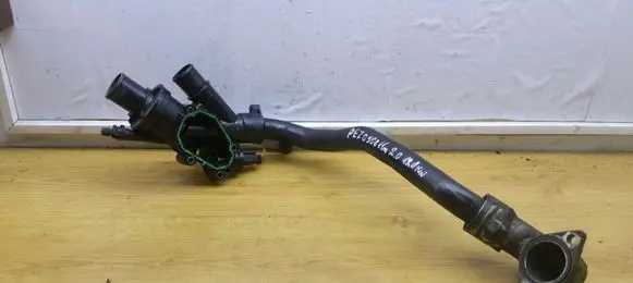 Thermostat/thermostat housing