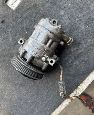 Opel Corsa C Air conditioning (A/C) compressor (pump) 24461719