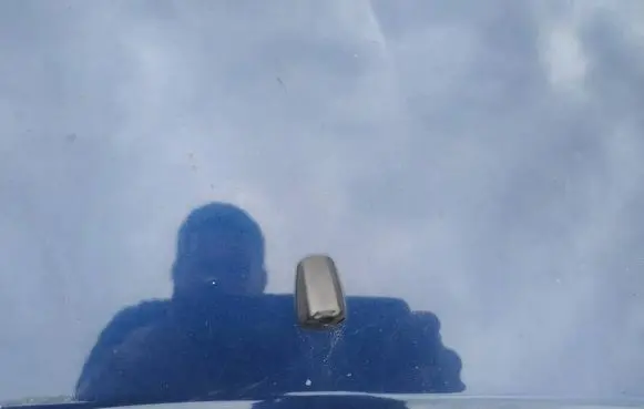 Windshield washer spray nozzle