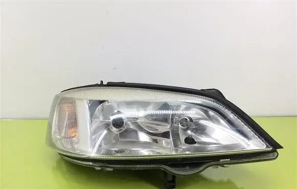 Opel Astra G Headlight/headlamp 009117304RH