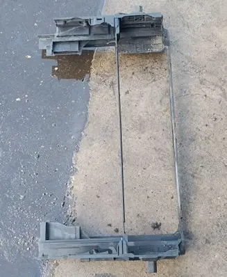 Top upper radiator support slam panel