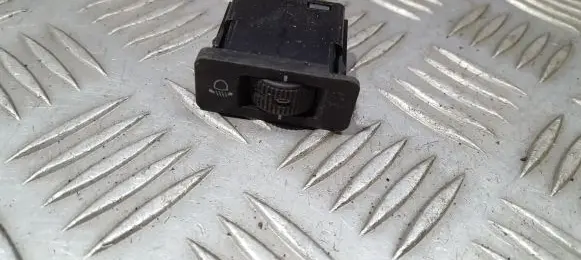 Headlight level height control switch