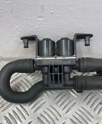 Coolant heater control valve