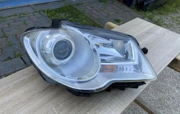 Volkswagen Touran I Headlight/headlamp 1T0941006B