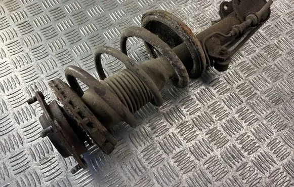 KIA Carens II Front shock absorber with coil spring