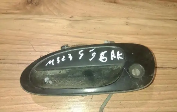 Mazda 323 Front door exterior handle
