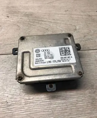 Volkswagen Golf VII Headlight ballast module Xenon 4G0907697H 28357978 401140244
