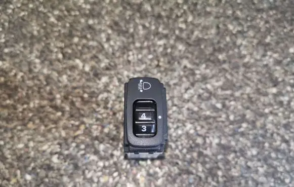Mitsubishi Lancer Headlight level height control switch