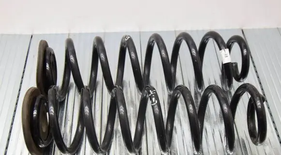 Volkswagen Tiguan Set of springs and shock absorbers (Front and rear) 5QF511115
