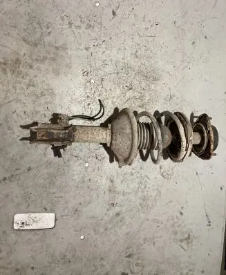 Subaru Legacy Front shock absorber with coil spring