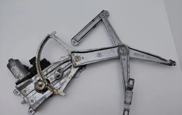 Opel Zafira A Front door window regulator with motor 90579572 90579356