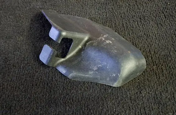 Subaru Legacy Front passenger seat rail trim 64115AG000