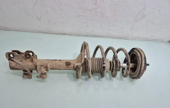 Nissan X-Trail T30 Rear shock absorber with coil spring 
